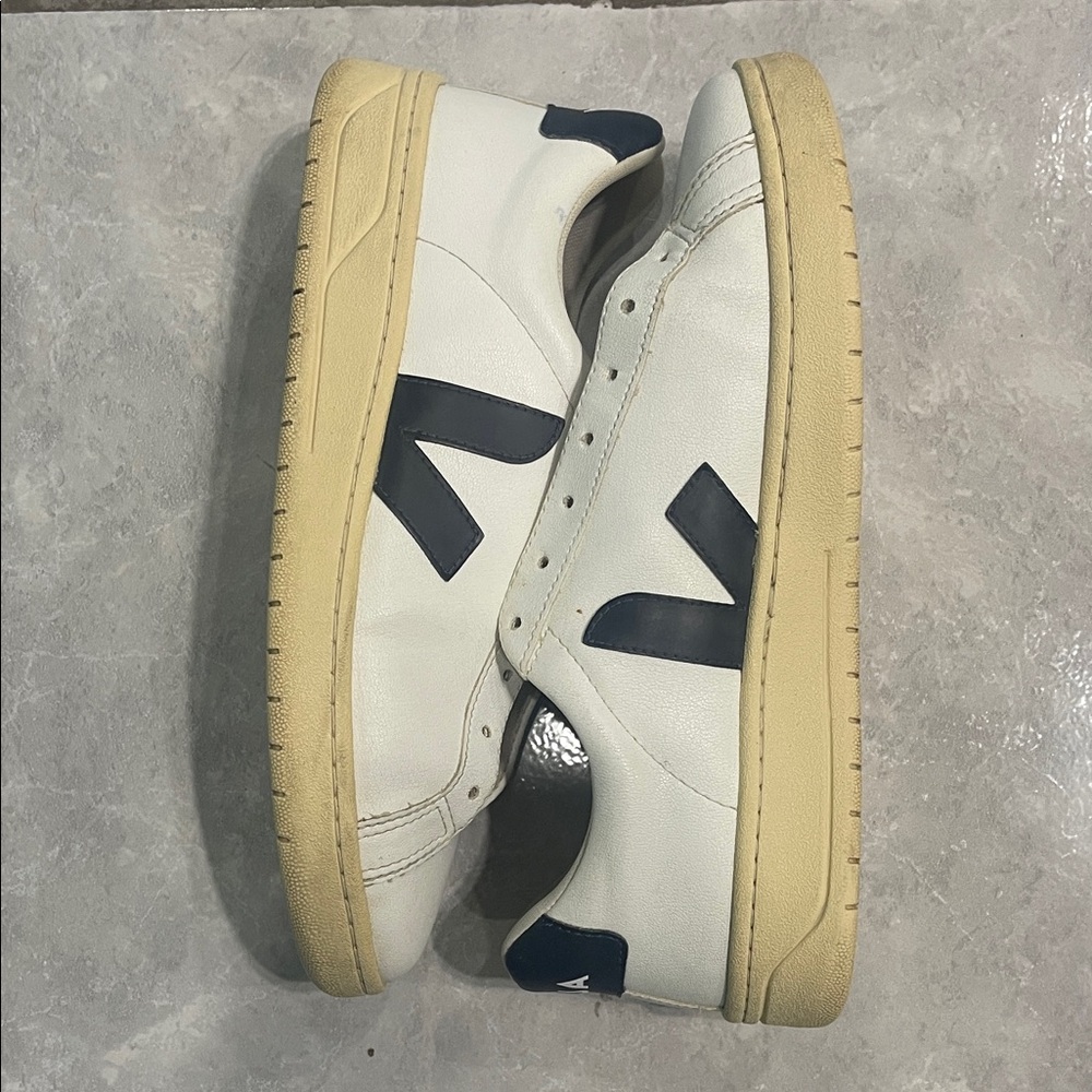 Veja women’s White and Tan Sneakers with Black Accents
